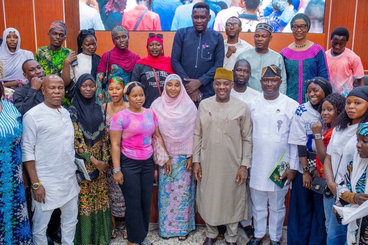 Young Nigerians with the Honourable Minister at an EIBIC engagement
